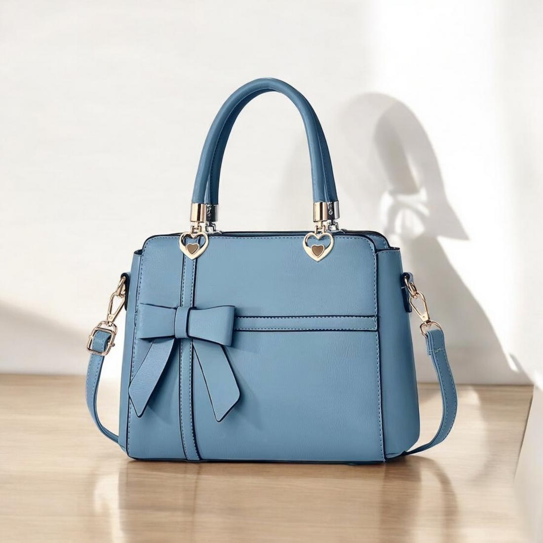 PUNCHED RIBBON HANDBAG
